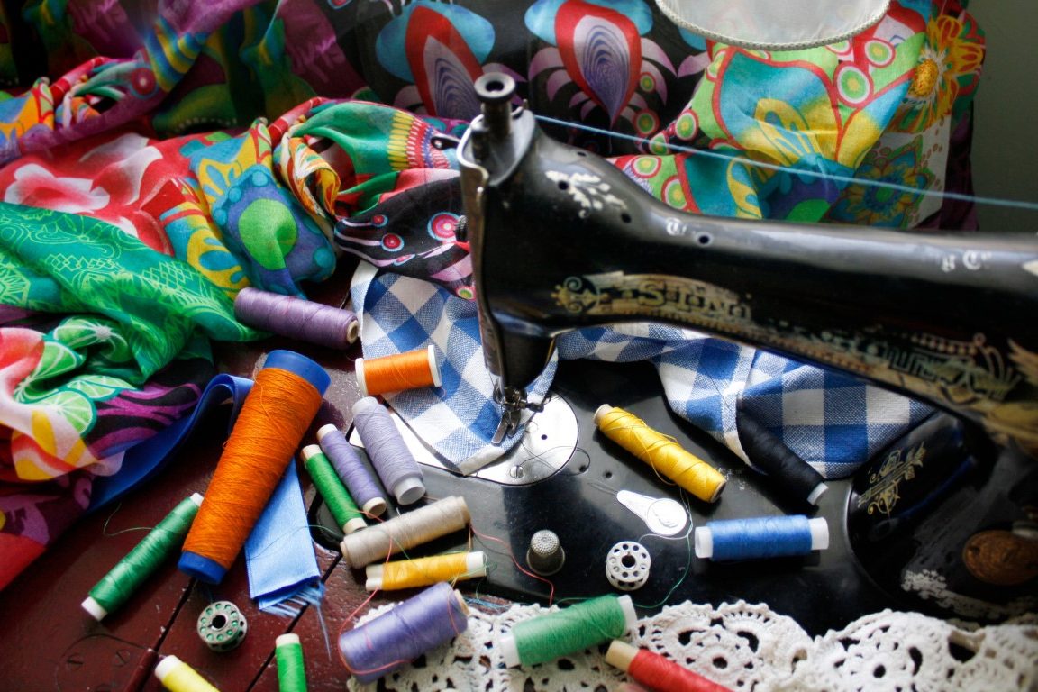 colorful-sewing-threads-and-a-sewing-machine-2022-11-08-00-02-09-utc