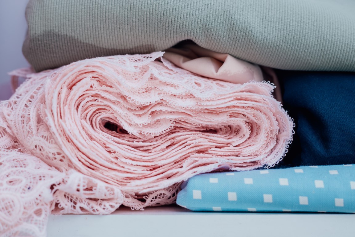 knitted fabric for sewing evening and ball gowns close-up.